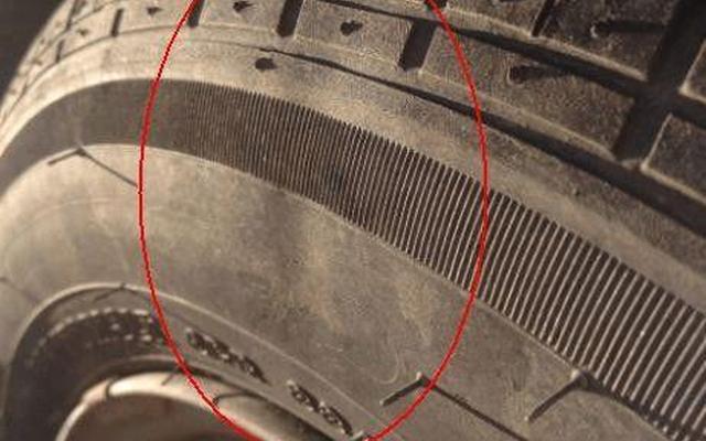 轮胎侧面鼓包了还能开吗